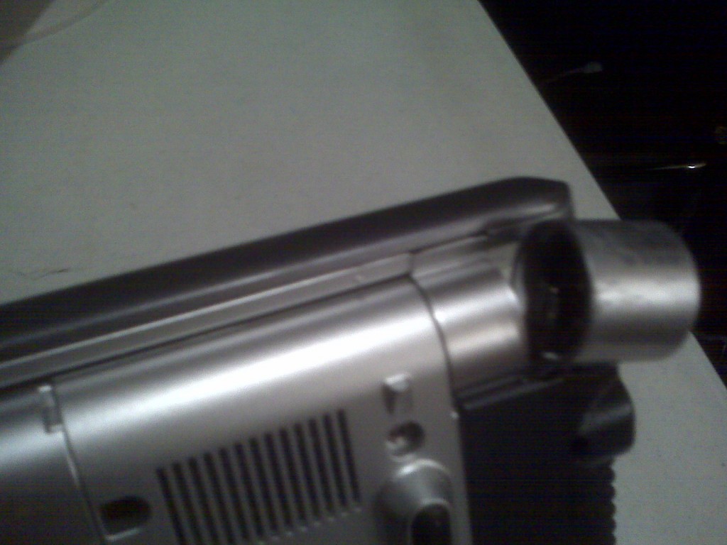 Power Jack is dangling off the side hinge